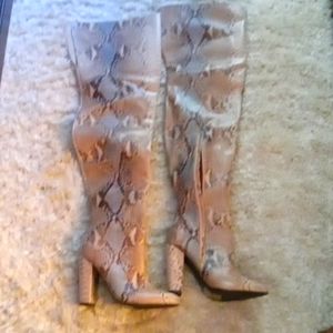 Snakeskin thigh high boots